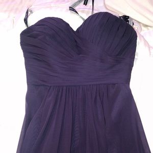 Flattering plum sweetheart top gown